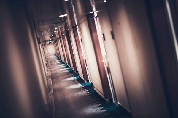 How can you design a UK hallway that is narrow yet functional?